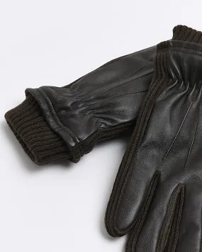 Brown leather gloves